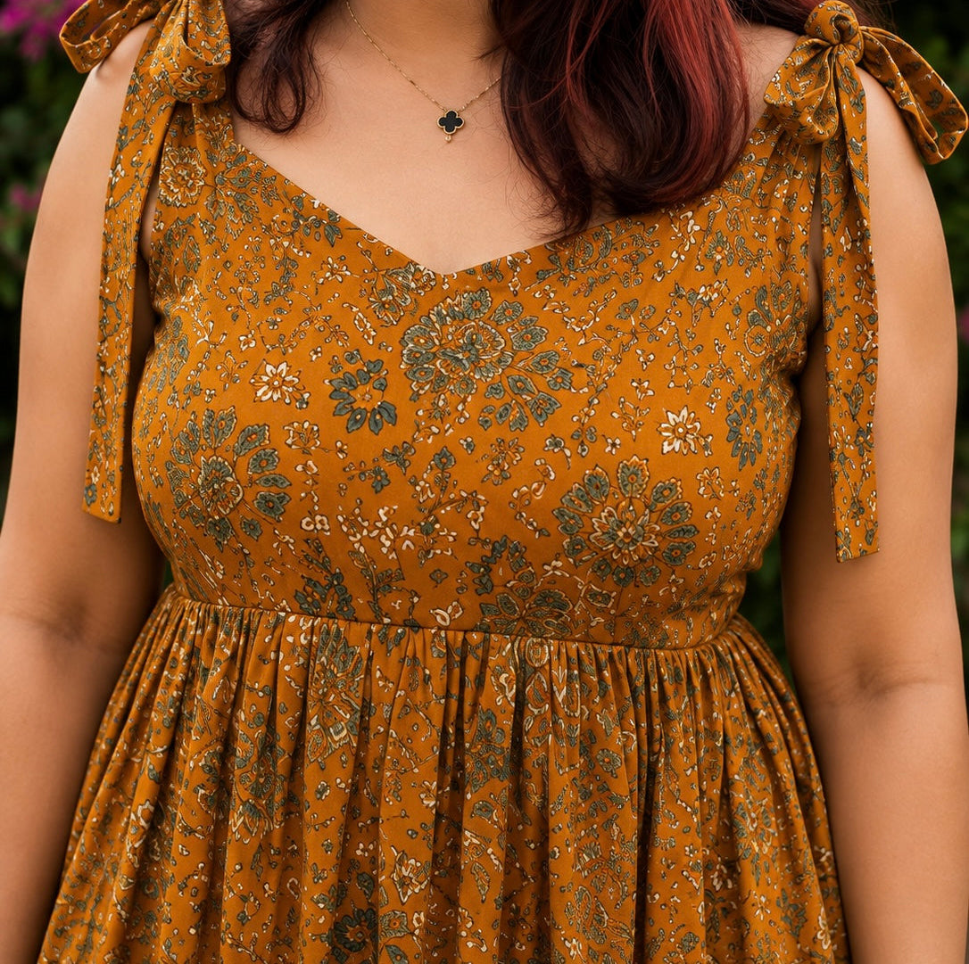 Mustard Floral Peplum Tie-Shoulder Top for Women | Soft Cotton Blend | Casual Chic | Free Size